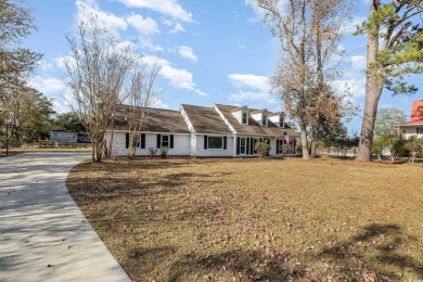 Have you been searching for a home that has access to deep water on Wedgefield Plantation Golf Club in South Carolina - for sale on GolfHomes.com, golf home, golf lot