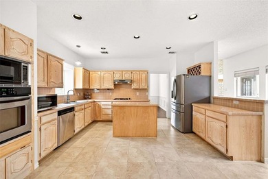 Welcome to this beautifully designed 4-bedroom, 3.5-bath home on The Courses at Watters Creek in Texas - for sale on GolfHomes.com, golf home, golf lot