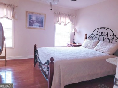 Stunning 7-Bedroom, 5-Bath All-Brick Home in Exclusive Gated on Eagles Landing Country Club in Georgia - for sale on GolfHomes.com, golf home, golf lot