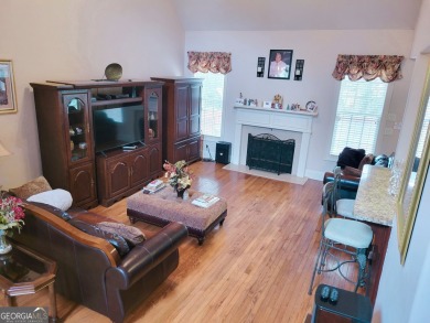 Stunning 7-Bedroom, 5-Bath All-Brick Home in Exclusive Gated on Eagles Landing Country Club in Georgia - for sale on GolfHomes.com, golf home, golf lot