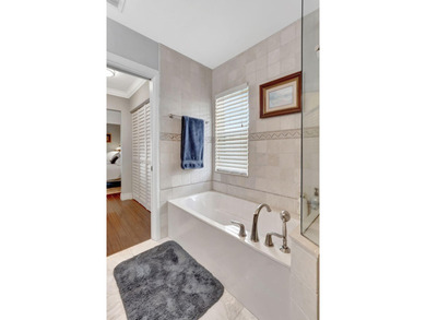 Beautifully updated in Delray Dunes. The 18 hole Pete Dye golf on Delray Dunes Golf and Country Club in Florida - for sale on GolfHomes.com, golf home, golf lot