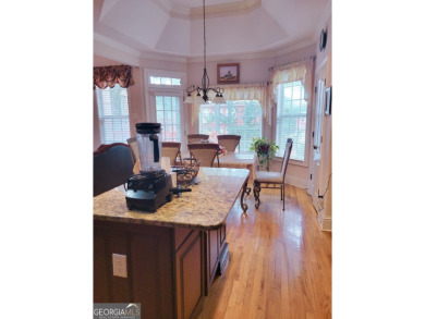 Stunning 7-Bedroom, 5-Bath All-Brick Home in Exclusive Gated on Eagles Landing Country Club in Georgia - for sale on GolfHomes.com, golf home, golf lot