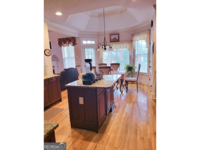 Stunning 7-Bedroom, 5-Bath All-Brick Home in Exclusive Gated on Eagles Landing Country Club in Georgia - for sale on GolfHomes.com, golf home, golf lot