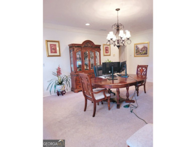 Stunning 7-Bedroom, 5-Bath All-Brick Home in Exclusive Gated on Eagles Landing Country Club in Georgia - for sale on GolfHomes.com, golf home, golf lot
