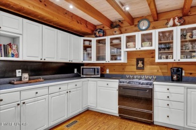 A stunning Log Home in Tellico Village! Discover the perfect on Toqua Golf Course - Loudon County in Tennessee - for sale on GolfHomes.com, golf home, golf lot