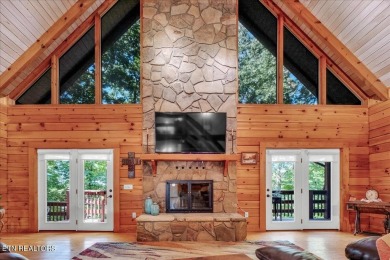 A stunning Log Home in Tellico Village! Discover the perfect on Toqua Golf Course - Loudon County in Tennessee - for sale on GolfHomes.com, golf home, golf lot