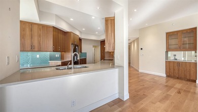 Indulge in spectacular, fully reimagined waterfront living in on Longboat Key Golf Club Resort in Florida - for sale on GolfHomes.com, golf home, golf lot