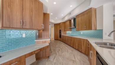 Indulge in spectacular, fully reimagined waterfront living in on Longboat Key Golf Club Resort in Florida - for sale on GolfHomes.com, golf home, golf lot