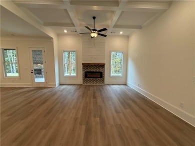 Stunning 2-story home with a 3rd car garage in a coveted on Traditions of Braselton Golf Club in Georgia - for sale on GolfHomes.com, golf home, golf lot