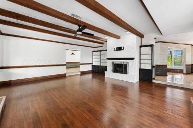 Perched on a scenic hilltop overlooking the lush greens of the on Palo Duro Creek Golf Club in Texas - for sale on GolfHomes.com, golf home, golf lot