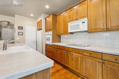 Tucked away on a serene and private 0.26-acre lot with lush on Pine Creek Golf Club in Colorado - for sale on GolfHomes.com, golf home, golf lot
