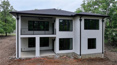 New Construction! This luxurious reverse  1.5 story 5 bedroom/3 on The Club At Porto Cima in Missouri - for sale on GolfHomes.com, golf home, golf lot