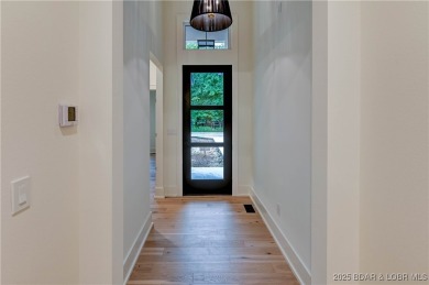 New Construction! This luxurious reverse  1.5 story 5 bedroom/3 on The Club At Porto Cima in Missouri - for sale on GolfHomes.com, golf home, golf lot