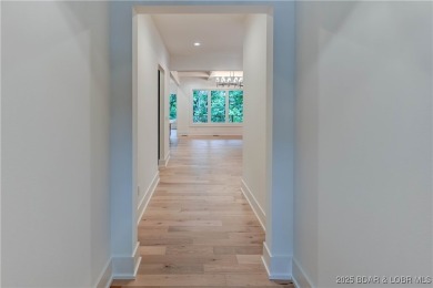 New Construction! This luxurious reverse  1.5 story 5 bedroom/3 on The Club At Porto Cima in Missouri - for sale on GolfHomes.com, golf home, golf lot
