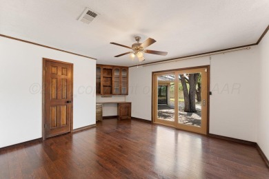 Perched on a scenic hilltop overlooking the lush greens of the on Palo Duro Creek Golf Club in Texas - for sale on GolfHomes.com, golf home, golf lot