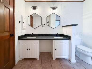 Perched on a scenic hilltop overlooking the lush greens of the on Palo Duro Creek Golf Club in Texas - for sale on GolfHomes.com, golf home, golf lot