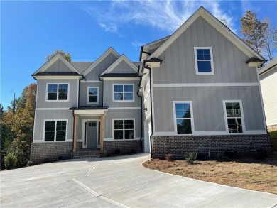 2 Story on a BASEMENT with a courtyard entry in resort style on Traditions of Braselton Golf Club in Georgia - for sale on GolfHomes.com, golf home, golf lot