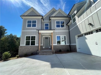 2 Story on a BASEMENT with a courtyard entry in resort style on Traditions of Braselton Golf Club in Georgia - for sale on GolfHomes.com, golf home, golf lot