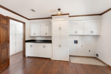 Perched on a scenic hilltop overlooking the lush greens of the on Palo Duro Creek Golf Club in Texas - for sale on GolfHomes.com, golf home, golf lot
