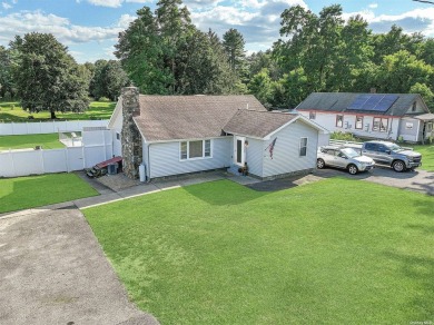 Welcome to this beautifully maintained home on a serene .39-acre on Sunnyside Par 3 Golf Course in New York - for sale on GolfHomes.com, golf home, golf lot