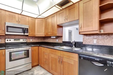 DRAMATICALLY REDUCED, SELLER IS MOTIVATED, Discover this on Wynmoor Golf Course in Florida - for sale on GolfHomes.com, golf home, golf lot
