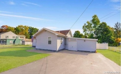 Welcome to this beautifully maintained home on a peaceful 0 on Sunnyside Par 3 Golf Course in New York - for sale on GolfHomes.com, golf home, golf lot