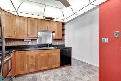 DRAMATICALLY REDUCED, SELLER IS MOTIVATED, Discover this on Wynmoor Golf Course in Florida - for sale on GolfHomes.com, golf home, golf lot