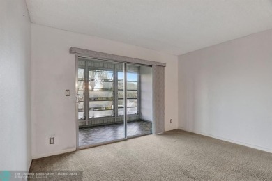 DRAMATICALLY REDUCED, SELLER IS MOTIVATED, Discover this on Wynmoor Golf Course in Florida - for sale on GolfHomes.com, golf home, golf lot