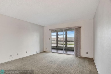 DRAMATICALLY REDUCED, SELLER IS MOTIVATED, Discover this on Wynmoor Golf Course in Florida - for sale on GolfHomes.com, golf home, golf lot