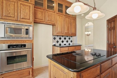 Gorgeous Drees custom home! Great curb appeal & amazing golf on Coyote Ridge Golf Club in Texas - for sale on GolfHomes.com, golf home, golf lot