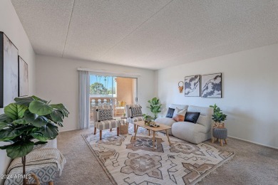 Beautifully maintained end unit condo located in a guard-gated on Scottsdale Shadows in Arizona - for sale on GolfHomes.com, golf home, golf lot