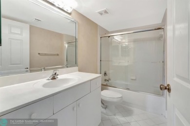Experience stunning lake views from this beautifully updated on Westchester Golf and Country Club in Florida - for sale on GolfHomes.com, golf home, golf lot