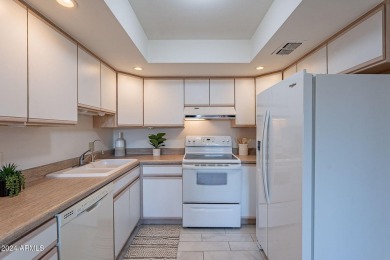 Beautifully maintained end unit condo located in a guard-gated on Scottsdale Shadows in Arizona - for sale on GolfHomes.com, golf home, golf lot