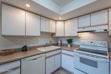 Beautifully maintained end unit condo located in a guard-gated on Scottsdale Shadows in Arizona - for sale on GolfHomes.com, golf home, golf lot