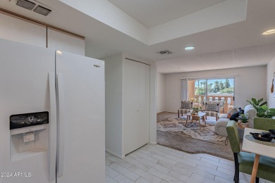Beautifully maintained end unit condo located in a guard-gated on Scottsdale Shadows in Arizona - for sale on GolfHomes.com, golf home, golf lot