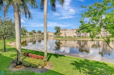 Experience stunning lake views from this beautifully updated on Westchester Golf and Country Club in Florida - for sale on GolfHomes.com, golf home, golf lot