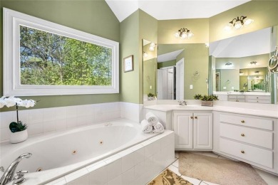 Nestled in the highly sought-after Towne Lake community and on Canongate At Eagle Watch Golf Club in Georgia - for sale on GolfHomes.com, golf home, golf lot