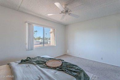 Beautifully maintained end unit condo located in a guard-gated on Scottsdale Shadows in Arizona - for sale on GolfHomes.com, golf home, golf lot