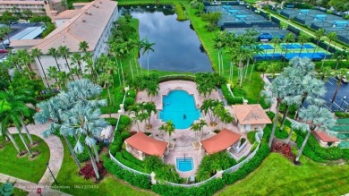 Experience stunning lake views from this beautifully updated on Westchester Golf and Country Club in Florida - for sale on GolfHomes.com, golf home, golf lot