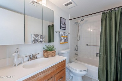 Beautifully maintained end unit condo located in a guard-gated on Scottsdale Shadows in Arizona - for sale on GolfHomes.com, golf home, golf lot