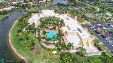Experience stunning lake views from this beautifully updated on Westchester Golf and Country Club in Florida - for sale on GolfHomes.com, golf home, golf lot