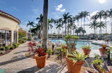 Experience stunning lake views from this beautifully updated on Westchester Golf and Country Club in Florida - for sale on GolfHomes.com, golf home, golf lot