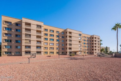 Beautifully maintained end unit condo located in a guard-gated on Scottsdale Shadows in Arizona - for sale on GolfHomes.com, golf home, golf lot