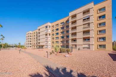 Beautifully maintained end unit condo located in a guard-gated on Scottsdale Shadows in Arizona - for sale on GolfHomes.com, golf home, golf lot