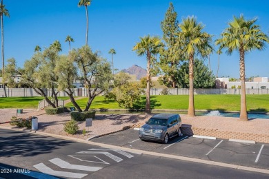 Beautifully maintained end unit condo located in a guard-gated on Scottsdale Shadows in Arizona - for sale on GolfHomes.com, golf home, golf lot