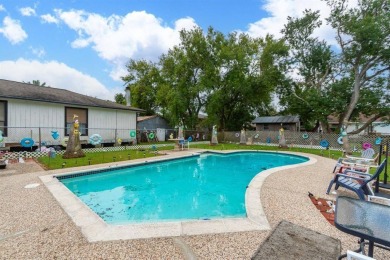 236 3rd St, San Leon, TX, is just two streets from the bay on Chapparral Rec Assoc Golf Club in Texas - for sale on GolfHomes.com, golf home, golf lot