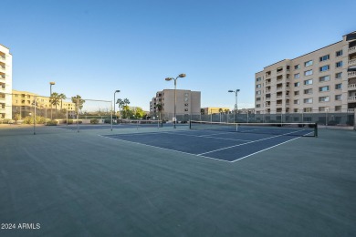 Beautifully maintained end unit condo located in a guard-gated on Scottsdale Shadows in Arizona - for sale on GolfHomes.com, golf home, golf lot