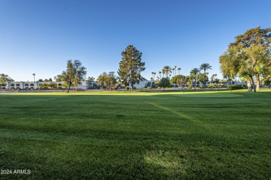 Beautifully maintained end unit condo located in a guard-gated on Scottsdale Shadows in Arizona - for sale on GolfHomes.com, golf home, golf lot
