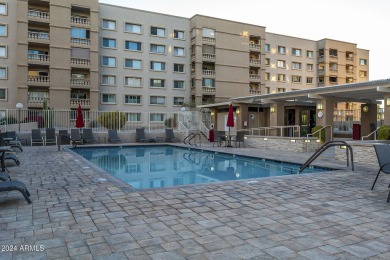 Beautifully maintained end unit condo located in a guard-gated on Scottsdale Shadows in Arizona - for sale on GolfHomes.com, golf home, golf lot