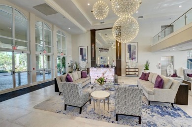 Discover breathtaking lake vistas from this stylishly renovated on Westchester Golf and Country Club in Florida - for sale on GolfHomes.com, golf home, golf lot